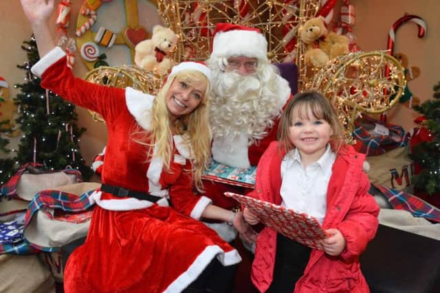 Three-year-old Scarlett Rose-Lewis was one of the first youngsters to visit Santa's grotto