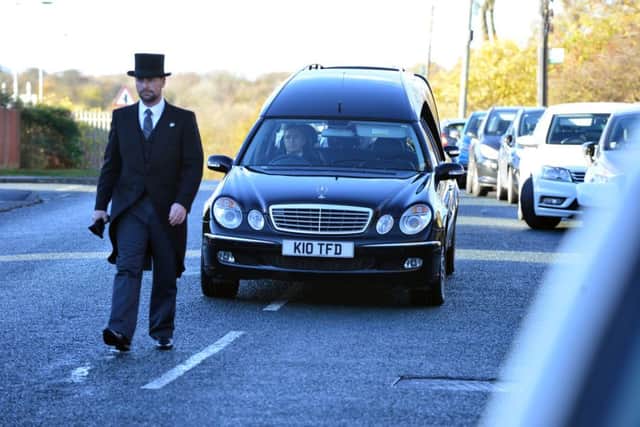 Frank Whyman is taken to his funeral, where veterans gathered to celebrate his life.