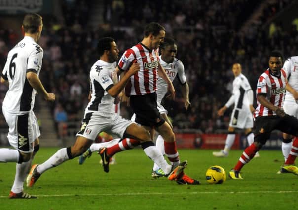 Sunderland defender John O'Shea tries to fight off Fulham's Mousa Dembele on this day five years ago, as Stephane Sessegnon looks on