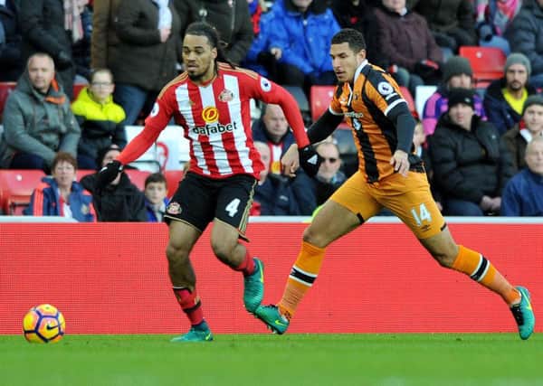 Jason Denayer gets away from Hull's Jake Livermore. Picture by FRANK REID