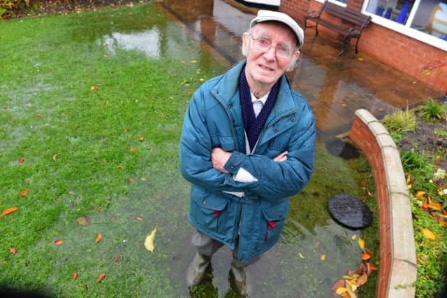 Cauldwell Place pensioner Sam Waim's garden has been flooded