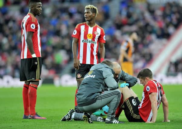 Sunderland's Paddy McNair receives treatment