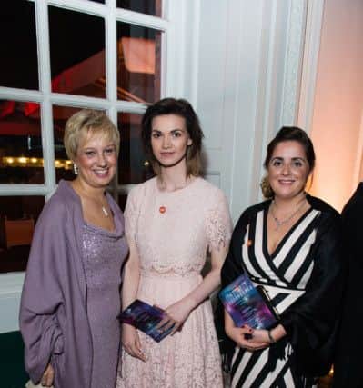Centrepoint staff Diane Cosstick and Laura Athey with award winner Carly Scott.