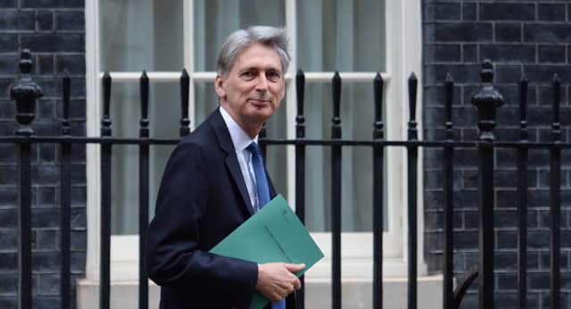 Chancellor Philip Hammond leaves 11 Downing Street, London, for the House of Commons as he prepares to deliver his Autumn Statement. PRESS ASSOCIATION Photo. Picture date: Wednesday November 23, 2016. See PA story BUDGET Main. Photo credit should read: Stefan Rousseau/PA Wire