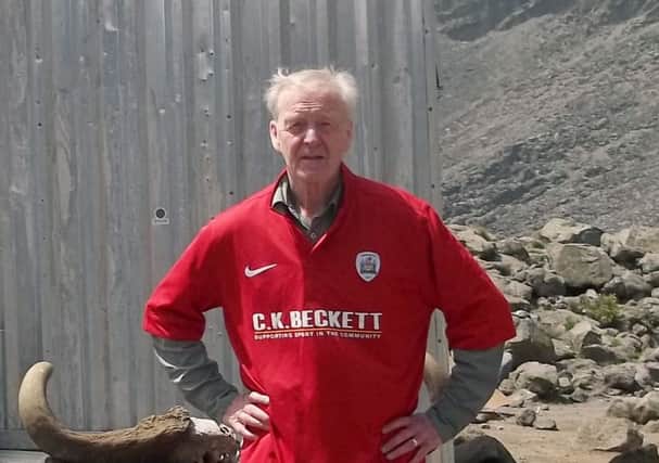 Rev Peter Amos of, Sports Chaplaincy UK at Mawenzi Tarn, just over halfway up Kilimanjaro, as part of his fundraising climb for an ME charity
