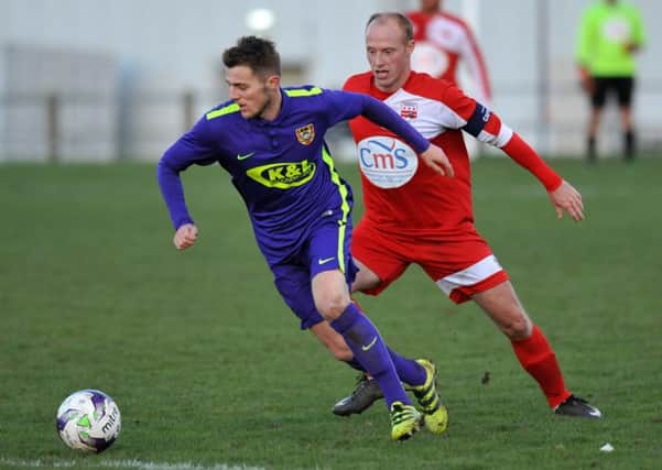 Ryhope CW take on Washington (red) in last week's Northern League derby. Picture by Tim Richardson