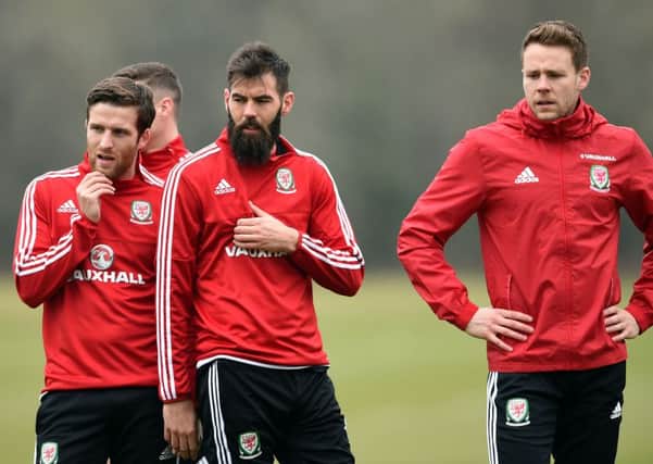 Wales' (left to right) Adam Matthews, Joe Ledley and Chris Gunter during a training session at the Vale Resort, Glamorgan.