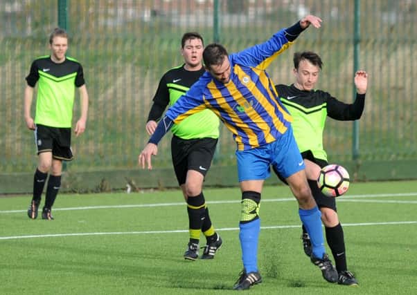 Wear United (blue and yellow) take on Penshaw CC in a recent Sunderland Sunday League clash