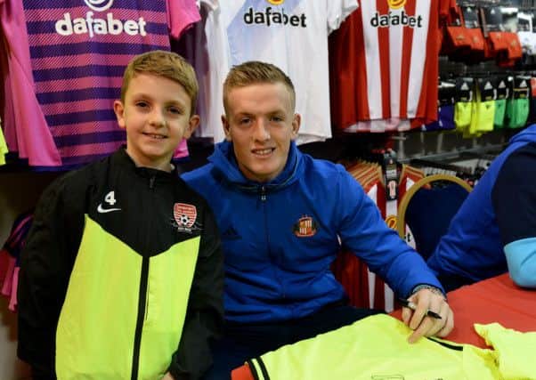 Noel Cambell-McGinn (8) meets Jordan Pickford during a signing session at the SAFC Club Shop in the Galleries, Washington. Picture by FRANK REID