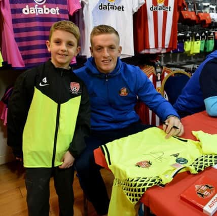 Noel Cambell-McGinn (8) meets Jordan Pickford during a signing session at the SAFC Club Shop in the Galleries, Washington. Picture by FRANK REID