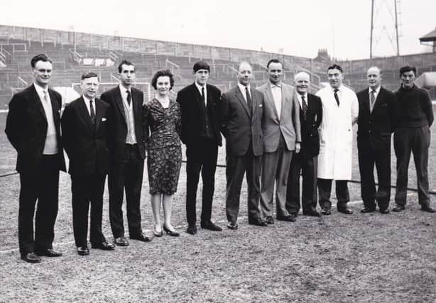 The 1964 Sunderland backroom staff. From left to right, Alan Brown (Manager), George Crowe (Secretary), Eddie Marshall (Assistant Secretary), Jack Jones (Trainer), Arthur Wright (Trainer), Bill Scott (Youth Team Trainer), Johnny Waters (Physio), Charlie Ferguson (Chief Scout), and Jack Dryden (Groundsman).