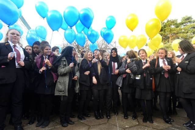 Thornhill School Business and Enterprise College hold a 50th anniversary balloon release.