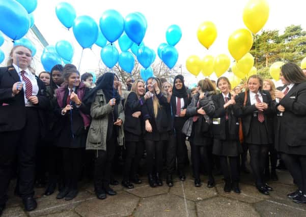 Thornhill School Business and Enterprise College hold a 50th anniversary balloon release.