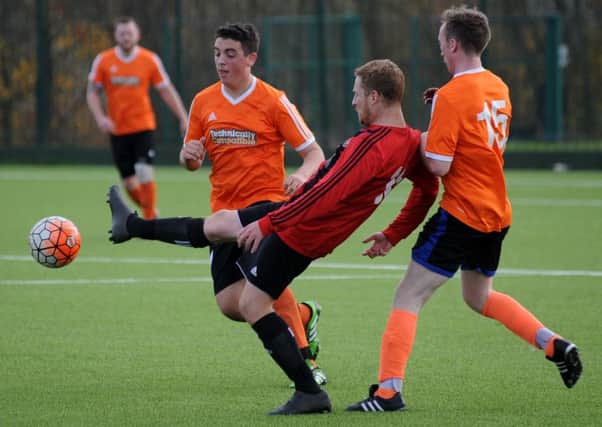 Westmount (red) take on TC in the Sunderland Sunday League recently