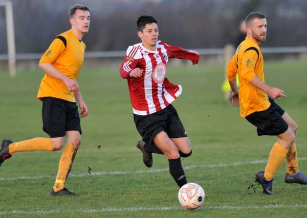 Sunderland West End (red and white) take on Annfield Plain in the Wearside League last weekend. Picture by Tim Richardson