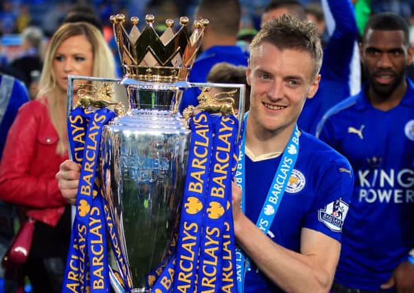 Leicester's Jamie Vardy with the Premier League trophy