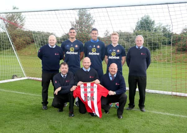 Back row (from left) Steadfast Security managing director Michael Harbord, Vito Mannone, Jack Rodwell, Duncan Watmore, Steadfasts Steve Hill Front row (from left) Steadfast managing director Dave Watson and directors Paul Harbord and Ian Harbord.