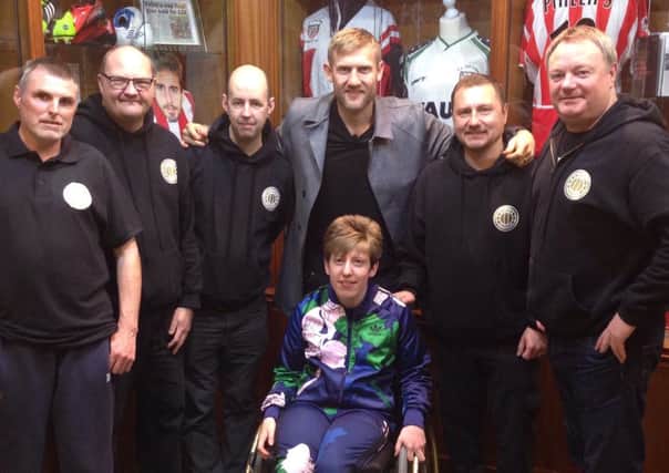 From left to right, Terry Marsh, Andrew Stuart Neil, Keith Charlton, former boxer Tony Jeffries, Michael Eggleston and Michael Ganley, and front, Paralympian Zoe Robinson.