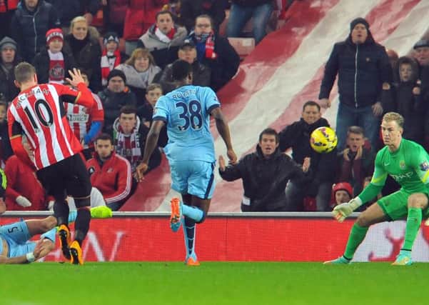 Connor Wickham scores Sunderland's opening goal in their 4-1 defeat to Manchester City two years ago today. Picture by Frank Reid