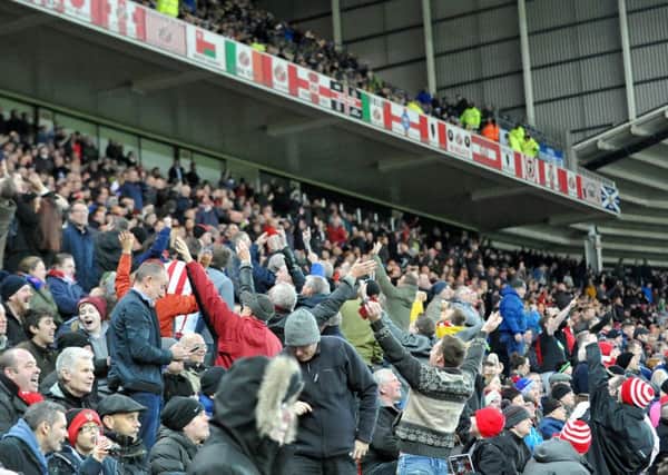 Sunderland fans celebrate victory against Leicester today. Picture by Frank Reid