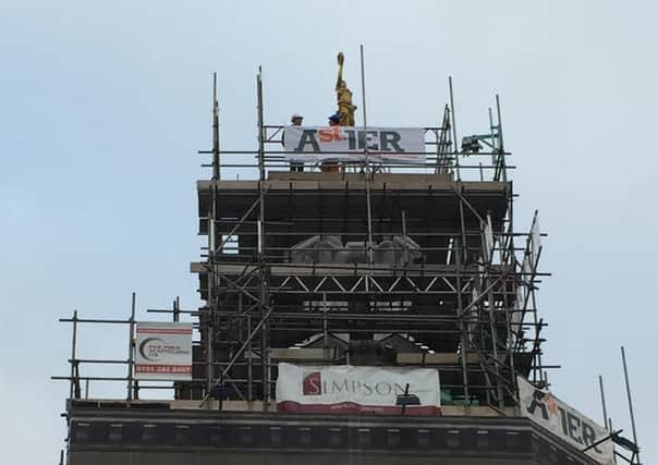 Terpsichore being put into place on the Sunderland Empire roof.