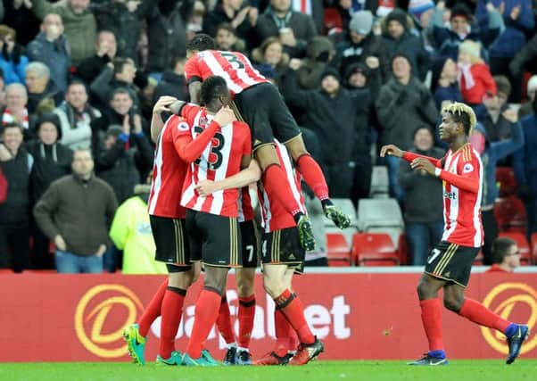 Jan Kirchhoff gets mobbed after his role in Sunderland's own goal opener against Leicester. Picture by Frank Reid