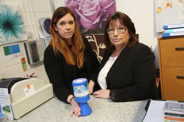 A collection tin has been stolen from the St Benedict's Hospice shop in Ryhope. Pictured are Shop Manager Ashley Davidson, left, with Retail Manager Marie Leighton. Picture: TOM BANKS