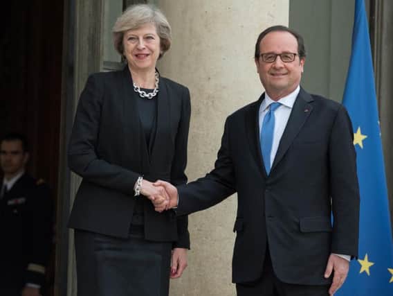 French President Francois Hollande welcoming the Prime Minister of United Kingdom Theresa May for a work visit at the Elysee Palace.