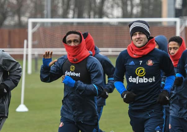 Jermain Defoe braves the cold in training