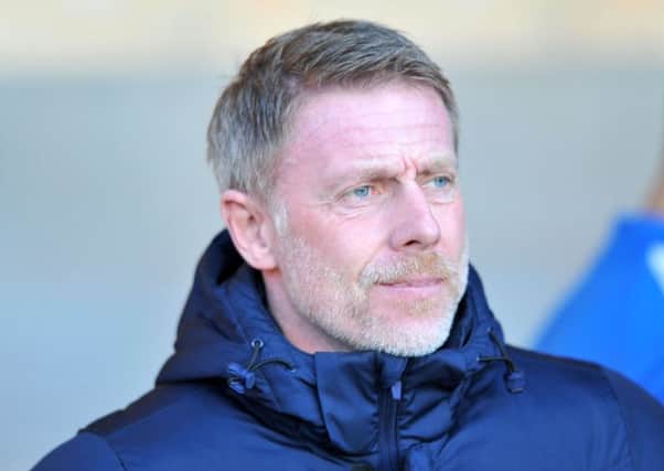 Pools boss Craig Hignett watches his slump to a 4-0 FA Cup defeat at Port Vale. Picture by Frank Reid