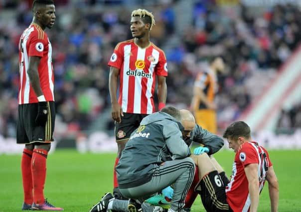 Paddy McNair undergoes treatment in the first half at the Stadium of Light. Picture by FRANK REID