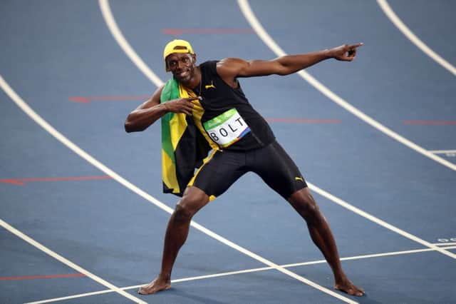 Jamaica's Usain Bolt celebrates winning the men's 100m final at the Olympics Stadium on the ninth day of the Rio Olympics Games, Brazil.