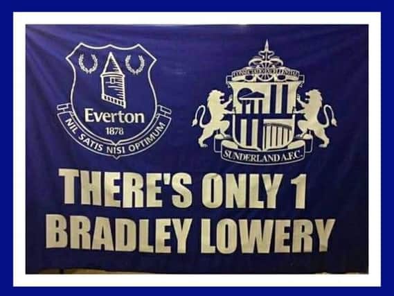 Evertone fans have displayed the flag for Bradley during their team's game against Watford.
