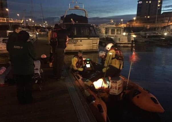 The RNLI and paramedics accompanied the woman to an waiting ambulance at Sunderland Marina.