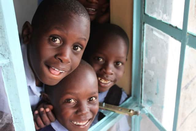 Children in their new solar classroom at Mercy Primary in Kenya