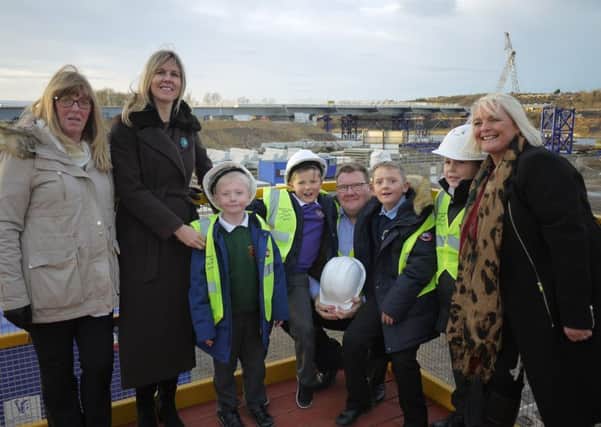 (l-r) Coun Amy Wilson, Helen Peverley, Mike Kelly, Karen Wood join youngsters Luke Petrie, Leon Jacob-Wood, Riley Robinson and Aidan Cooper.