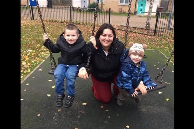 Fundraiser Georgina Carapiet with her two children, Jonjo Woolford, four, and  Andrew Carapiet, seven.