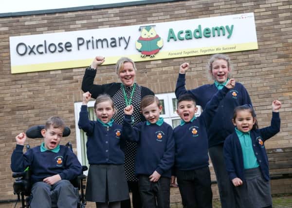 Oxclose Primary Academy in Washington is celebrating after being given a 'Good' rating by Ofsted. Pictured with head teacher Audrey Bolam are pupils Jay Flynn, Abigail Reed, Jude Norton, Nazeem Miah, Faye Holbrook and Jessica Hernandez. Picture: TOM BANKS