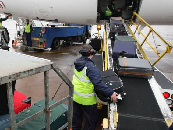 Talks aimed at averting a pre-Christmas strike by baggage handlers and other staff at 18 airports will be held at Acas this week. Pic: PA.