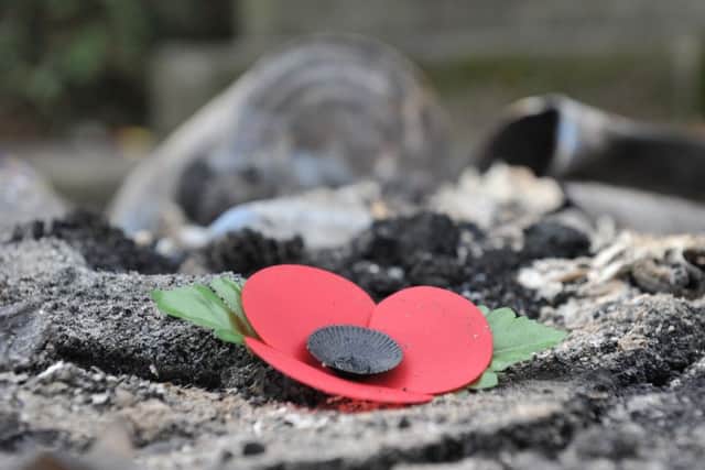 Poppy wreaths from the Silksworth Park War Memorial have been burnt at the rear of the bandstand.