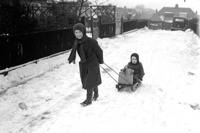 Enjoying the snow in 1941.