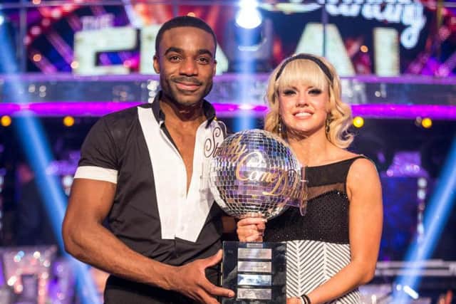 Joanne Clifton and Ore Oduba with the glitterball trophy after they won the final of the BBC1 show Strictly Come Dancing, which has 13 entries in the 40 most-watched TV programmes of 2016. Pic: Guy Levy/BBC/PA Wire.