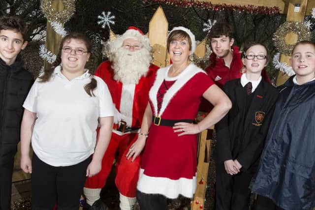 Students from Barbara Priestman Academy meet Santa and Mrs Claus.