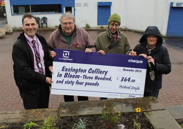 East Durham Homes Peter Eldrett with Michael Welsh, Andrew Maddison and Elizabeth Welsh from Easington Colliery in Bloom.