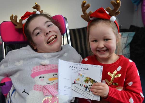 Dear Santa Competition runner up, Courtney Collier, 13 with younger sister Laila McAneny, 5