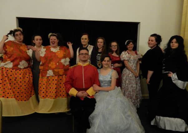 A collection of cast members from Cinderella by Phoenix Productions.