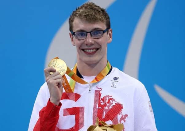 Matt Wylie with his medal after claiming victory at the Paralympics in Rio.