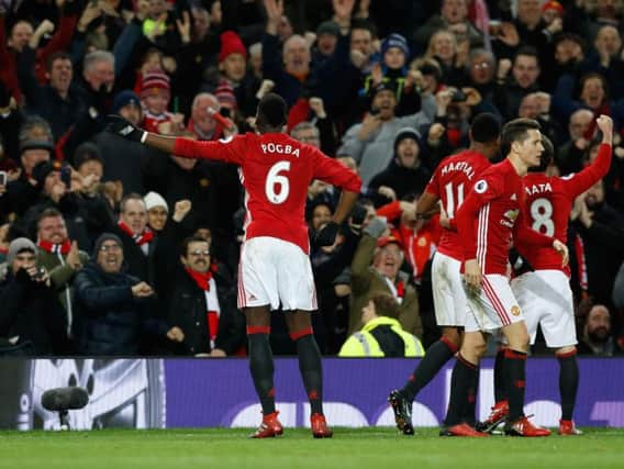 Paul Pogba celebrates his winner for Man United