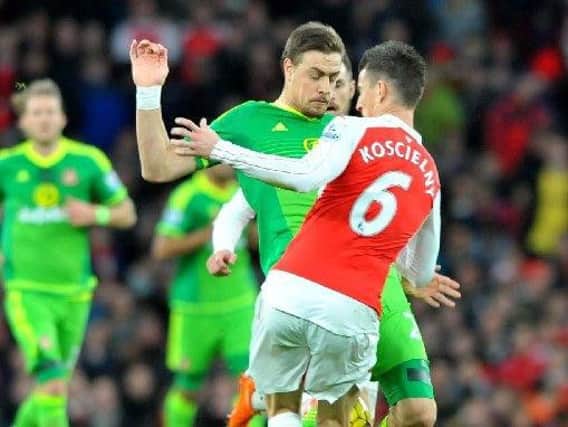 Sebastian Coates in action for Sunderland at Arsenal in last season's FA Cup, his final appearance for the club