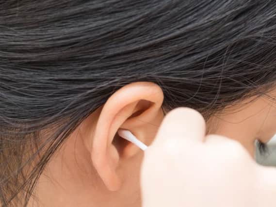 Sticking a cotton bud in your ears is not recommended.